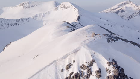 snowy mountain peaks aerial view