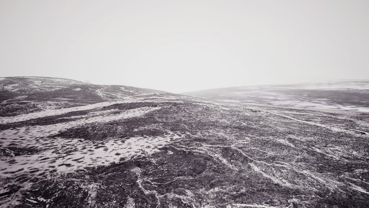 Transformative beauty of a snowy landscape under a cloudy sky