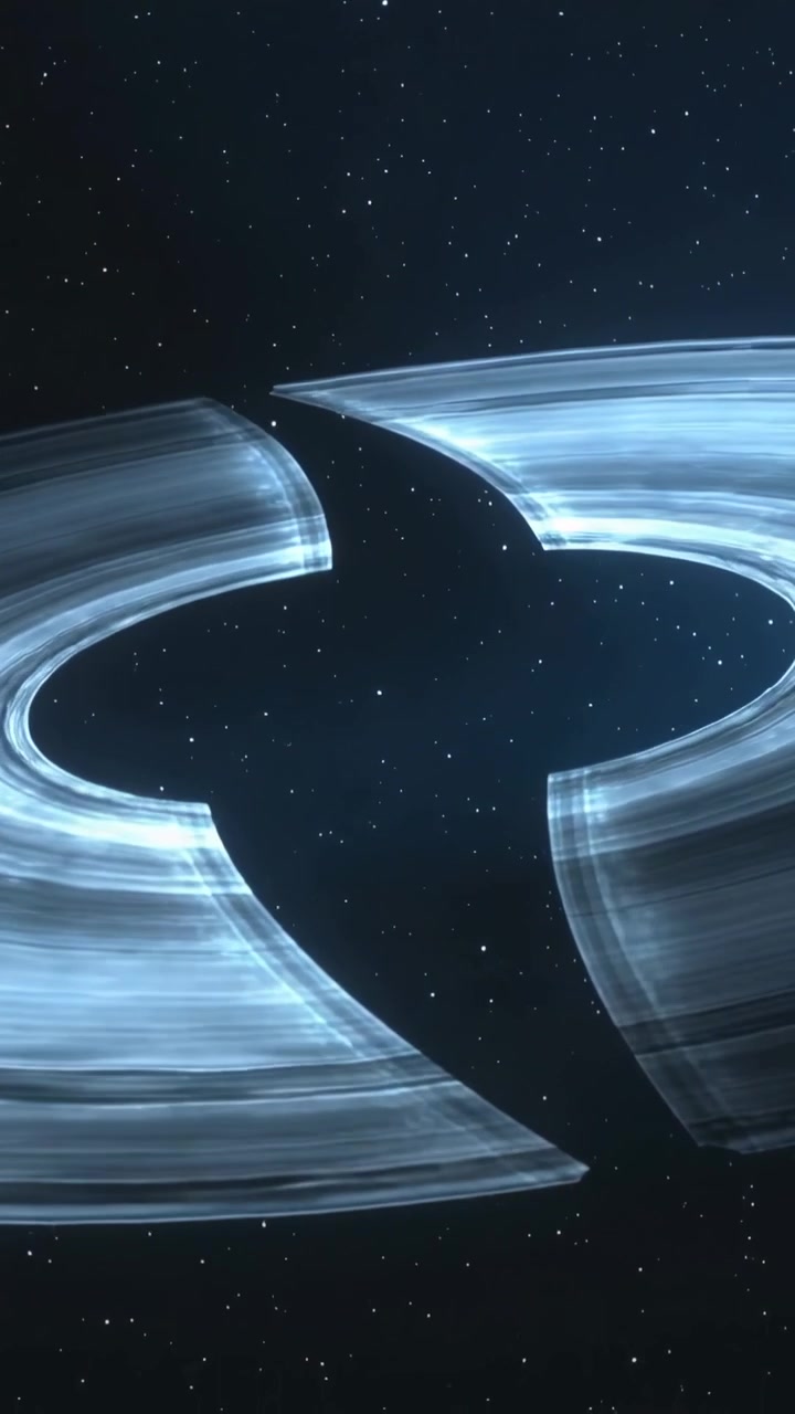 Vertical video: Rotating glowing torus revealing sliding dark void in deep space, against starfield