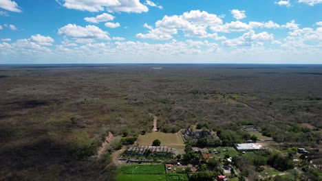 frontal-drone-shot-of-mayan-ruins-abandoned-at-yucatan-jungle-in-mexico