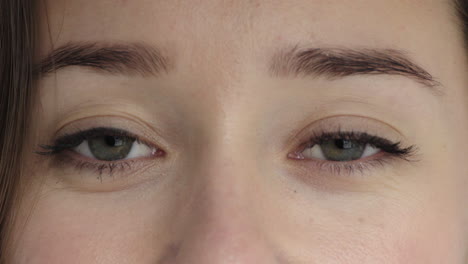 close-up-beautiful-caucasian-woman-eyes-blinking-looking-at-camera-happy-eyesight-optical-health-concept