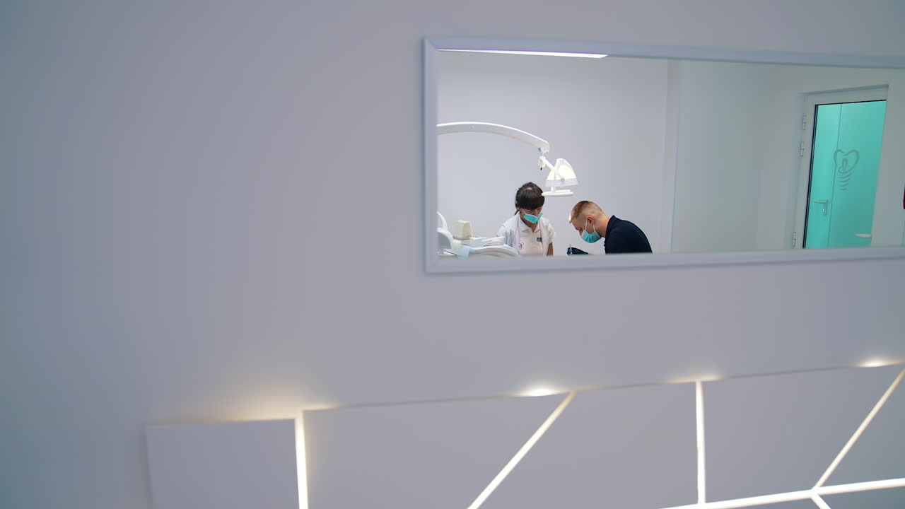 Couple stomatology teamwork. Professional stomatology treatment.