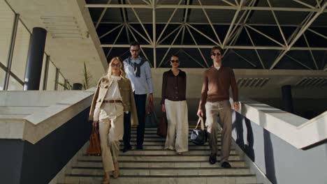 business people walking upstairs