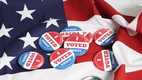 buttons of i voted today on us flag