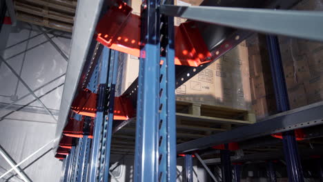 warehouse storage rack with pallets and boxes