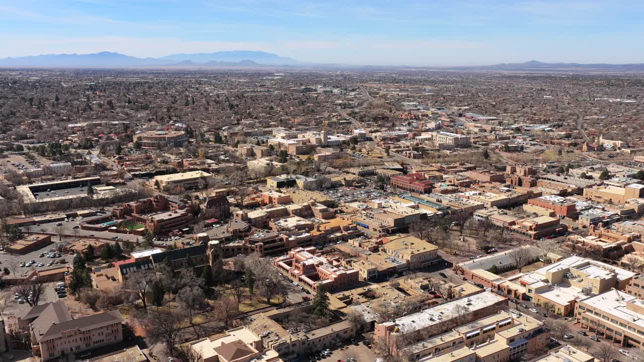 A breathtaking perspective of Santa Fe's desert landscape and Southwestern urban core. This 4K establishing shot is perfect for travel documentaries and regional tourism media