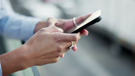 Hands using a smartphone