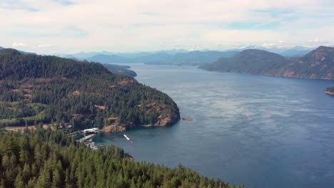 Drone-Flight-over-Campbell-River:-Ocean,-Mountains,-and-Trees-of-Vancouver-Island-Captured-from-Above