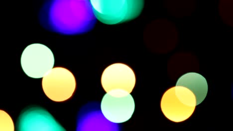 bokeh blinking christmas lights on black