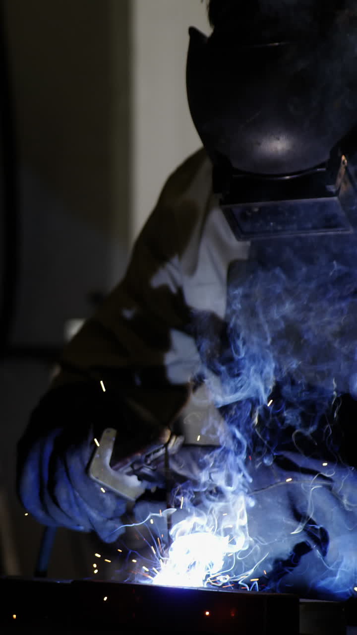 Welder welding a metal