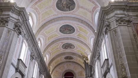 intricate painted ceiling arches in bom jesus church, braga, portugal, with soft lighting