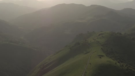 Green-mountains-of-Iraty-on-misty-and-sunny-day,-France