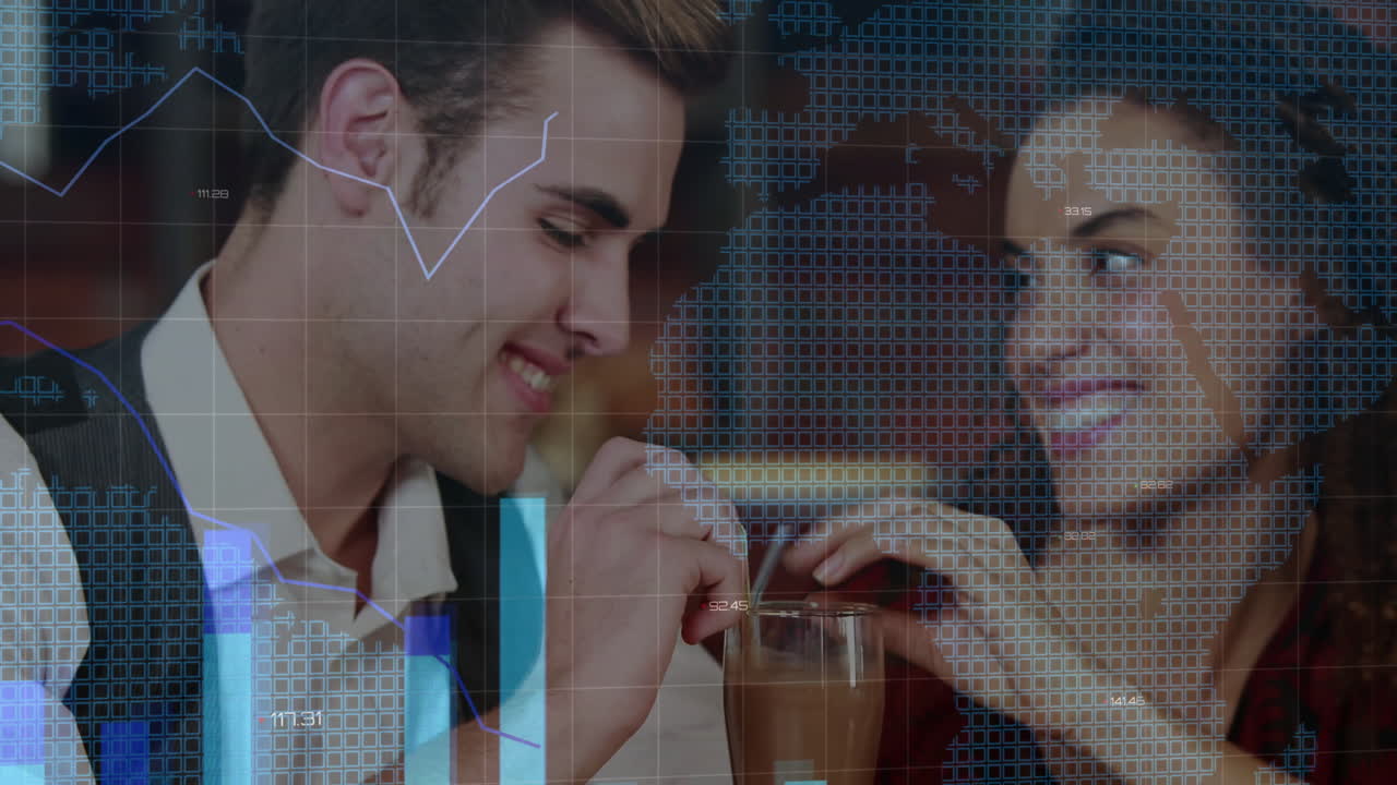 Romantic couple sipping tall glass with dual straws in cafe with floating finance data charts