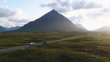 the incredible glencoe valley seen from the drone. this is the only road in this ancient volcanic area and it is surrounded by great mountains