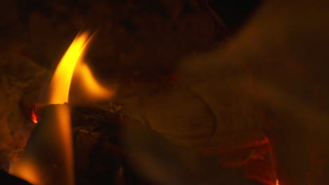 slow motion close up, firewood burning in a fireplace