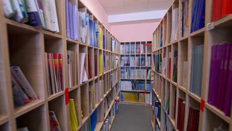 bookshelves in university library. interior of the library with shelves full of books