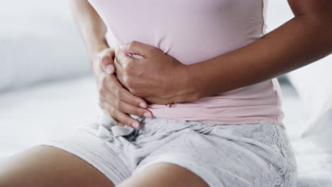 woman experiencing stomach pain