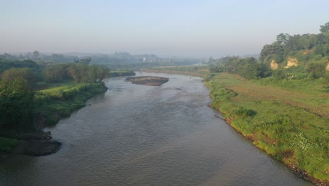 river landscape with foggy morning