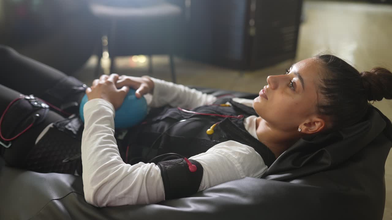 Woman resting in EMS vest
