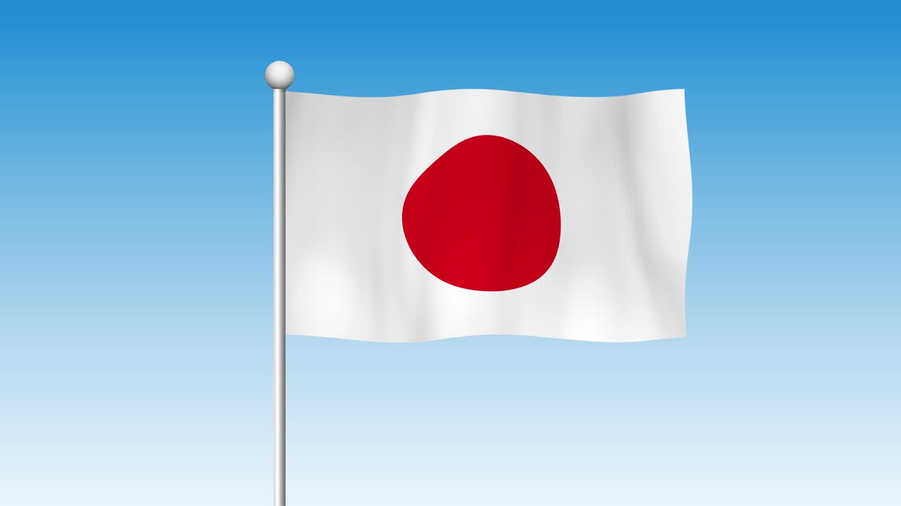 bandera japonesa ondeando contra un cielo azul