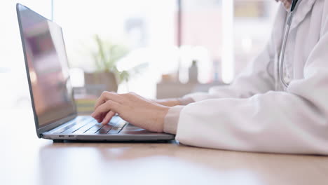 hands, research or doctor typing on laptop