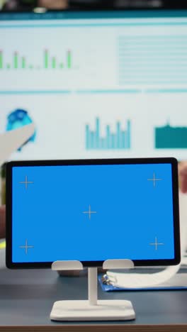 vertical video multiethnic team of businesswomen with a mockup display