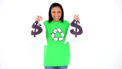 Happy-attractive-environmental-activist-showing-two-sacks-with-the-dollar-sign-on-them