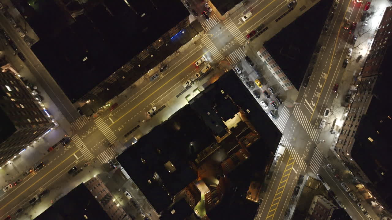 Aerial view of Harlem streets at night. Shot in New York City