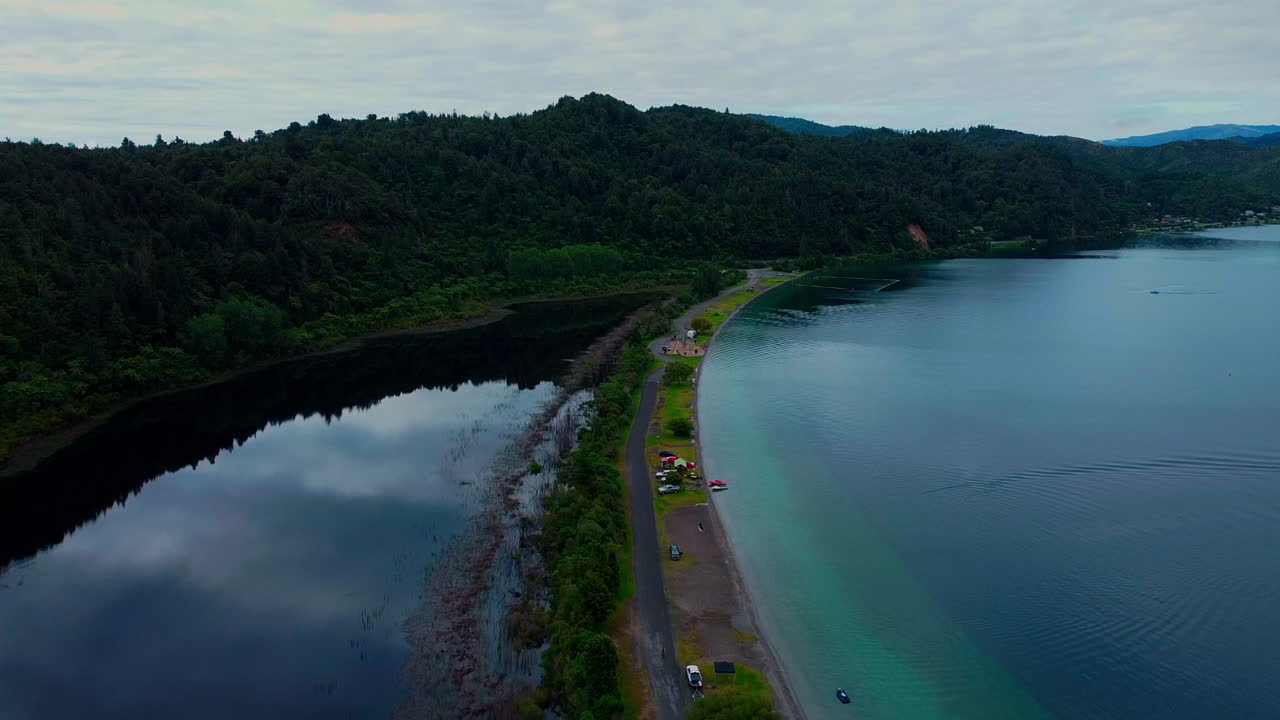 Lake on one side of the road and pond on the other side, Lake Rotoma, Rotorua, New Zealand.