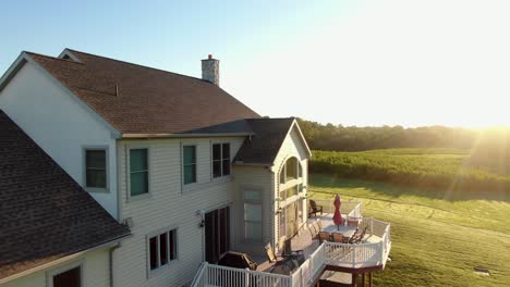 aerial view, rear of home with large deck for outdoor living