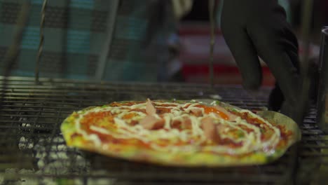 close-up vietnamese pancake getting finish and served