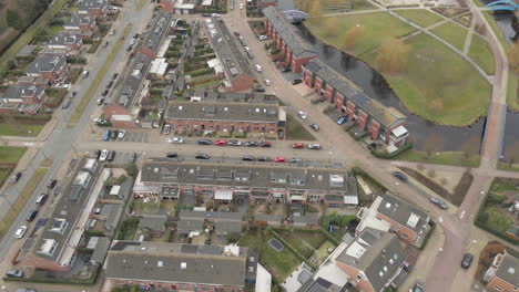 flying over houses in beautiful suburban neighbourhood