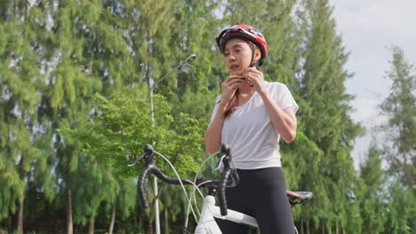 woman cycling in a park