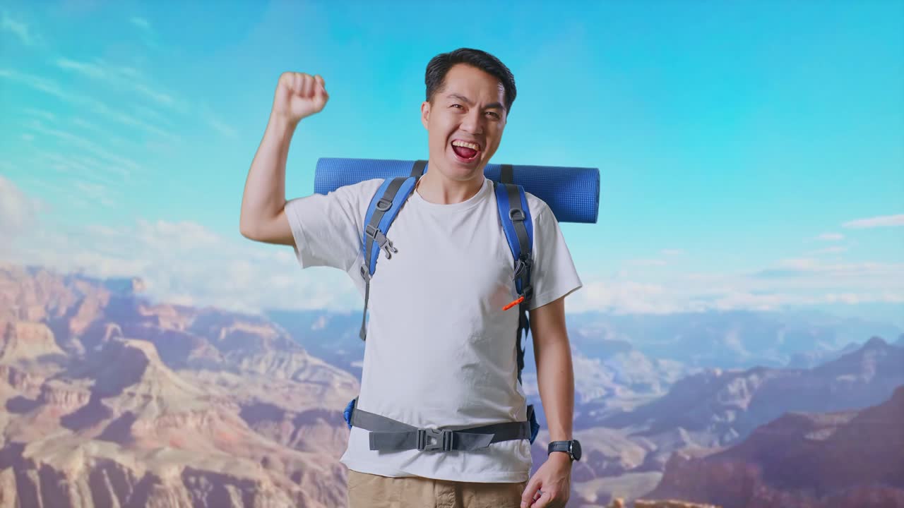 Asian Male Hiker With Mountaineering Backpack Screaming Goal Celebrating The Success While Traveling At The Top Of Mountain