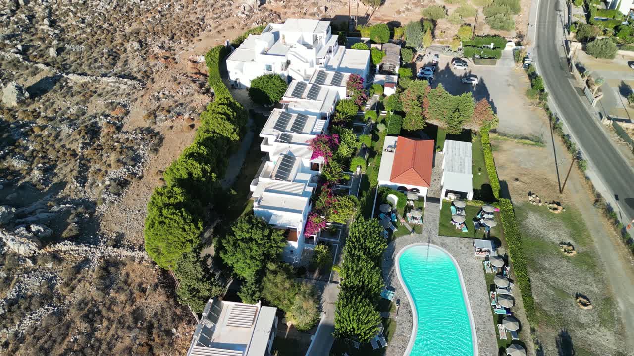 Stunning Lindos Sun hotel aerial drone flyover, Rhodes, Greece