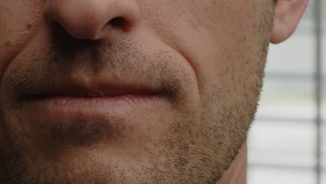 man with facial hair close up smiling