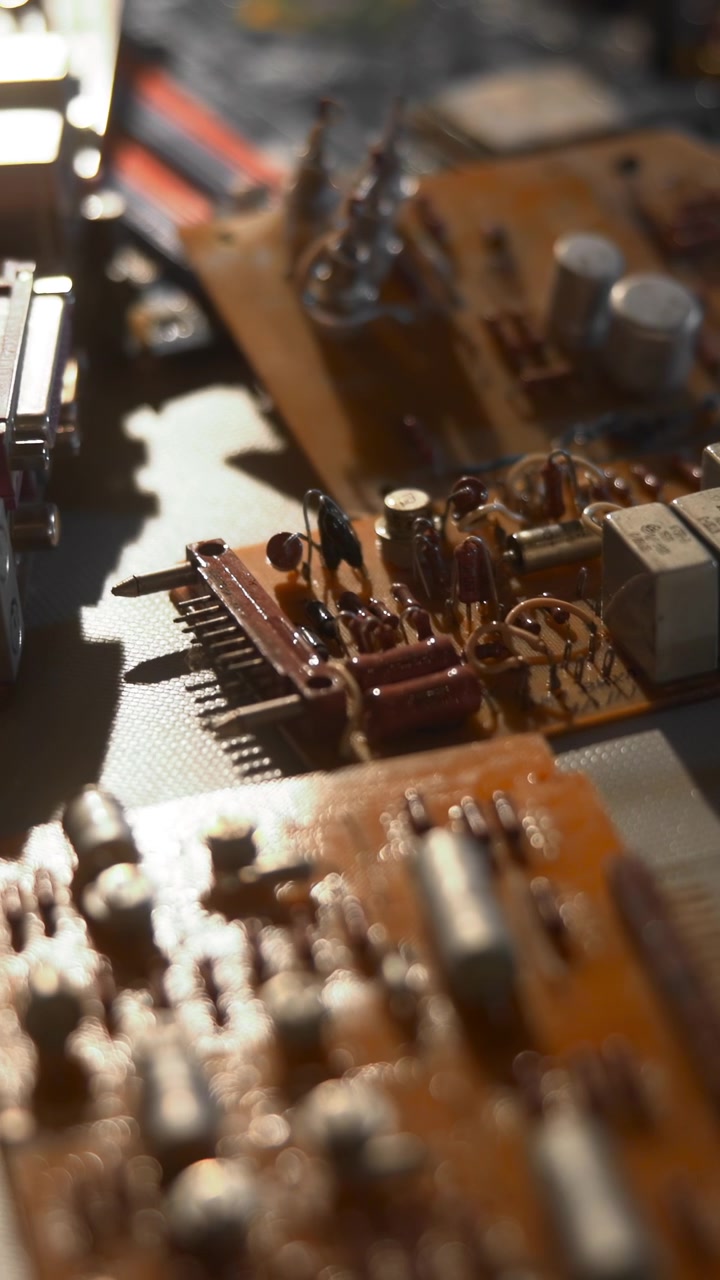 Closeup Circuit Board On Workbench Showing Solder Points, Traces And Component Outlines Technician Prepping