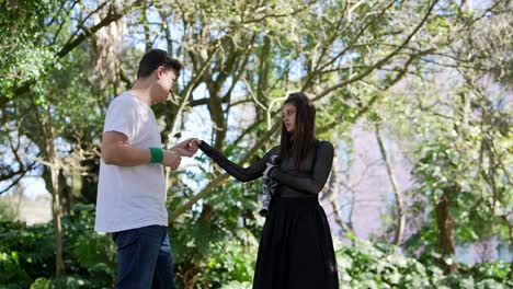 teenagers having a conversation in a park