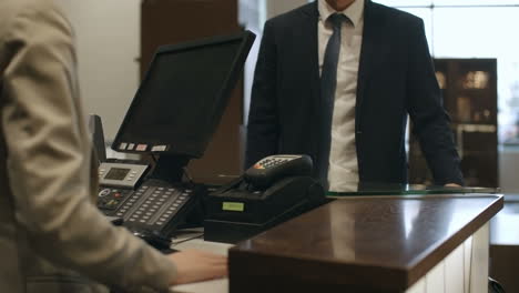 businessman at a hotel reception 1