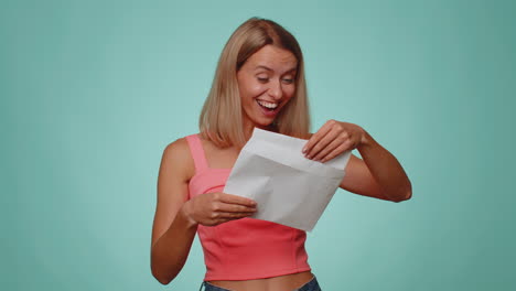 Woman-open-envelope-letter-reads-it-feel-happy,-career-growth-advance-promotion,-bank-loan-approve