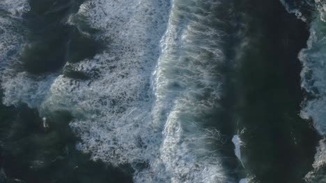 waves crashing in a beach in the southern chilean coast