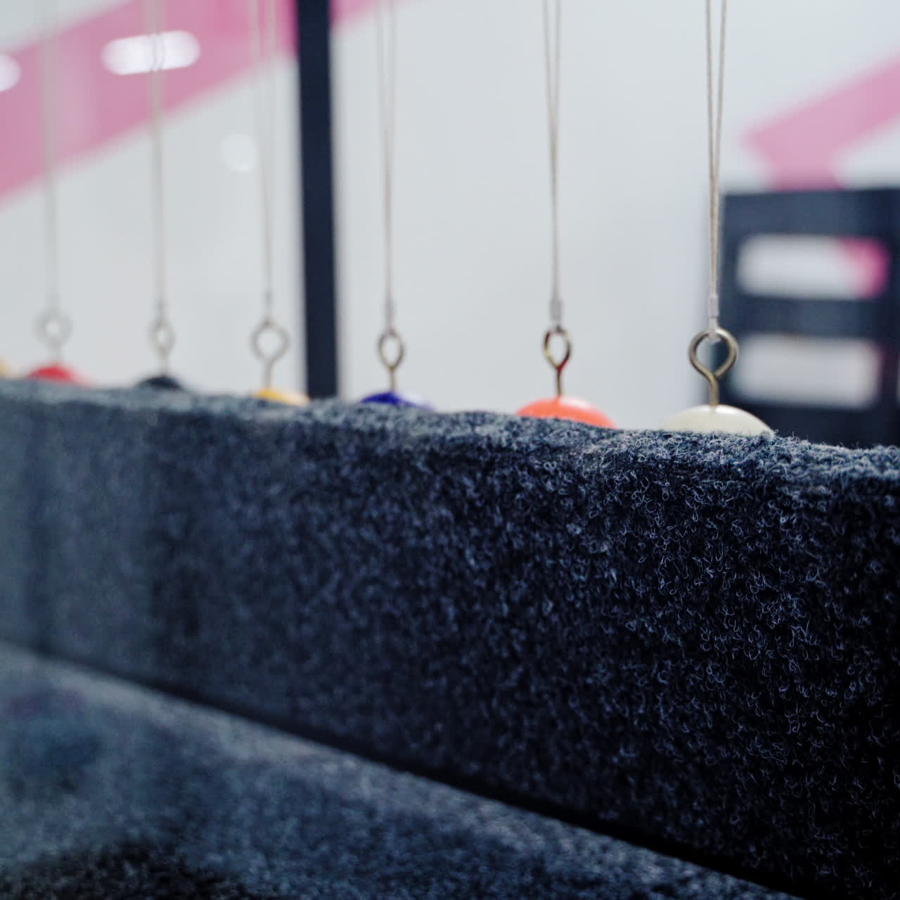 Balancing balls of Newton's cradle. Museum of Science