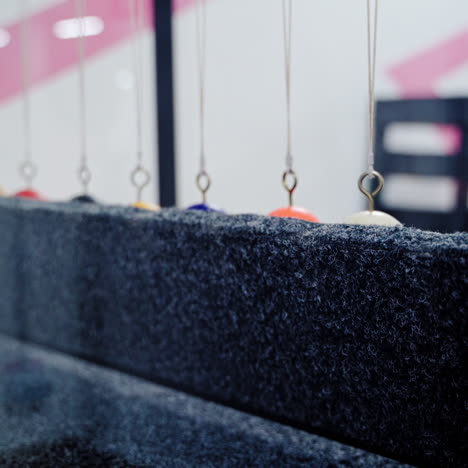 balancing balls of newton's cradle. museum of science