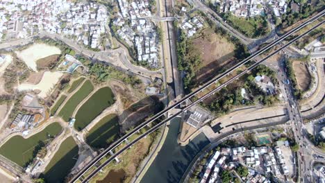 Aerial-view-of-an-MTR-Train-bridge-crossing-in-downtown-Hong-Kong