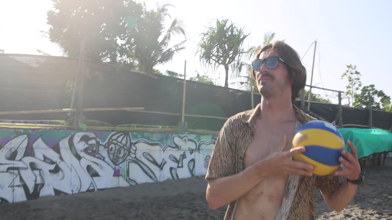 hombre girando la pelota en el dedo.