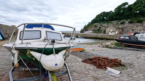 a boat docked with ropes and equipment