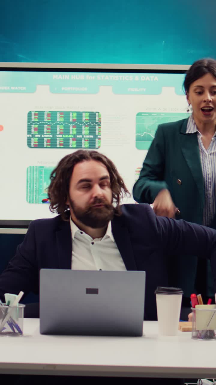 Diverse Business Professionals Analyzing Data in Office Meeting