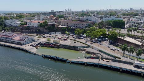 collapsed part of puerto don diego created sinkhole submerged in water, caused by heavy load of steel in santo domingo, dominican republic