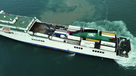 ferry with cars and cargo in the ocean