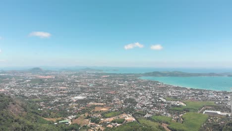 top wide view over mueang phuket district urbanised tropical landscape in phuket, thailand - aerial wide top panoramic view